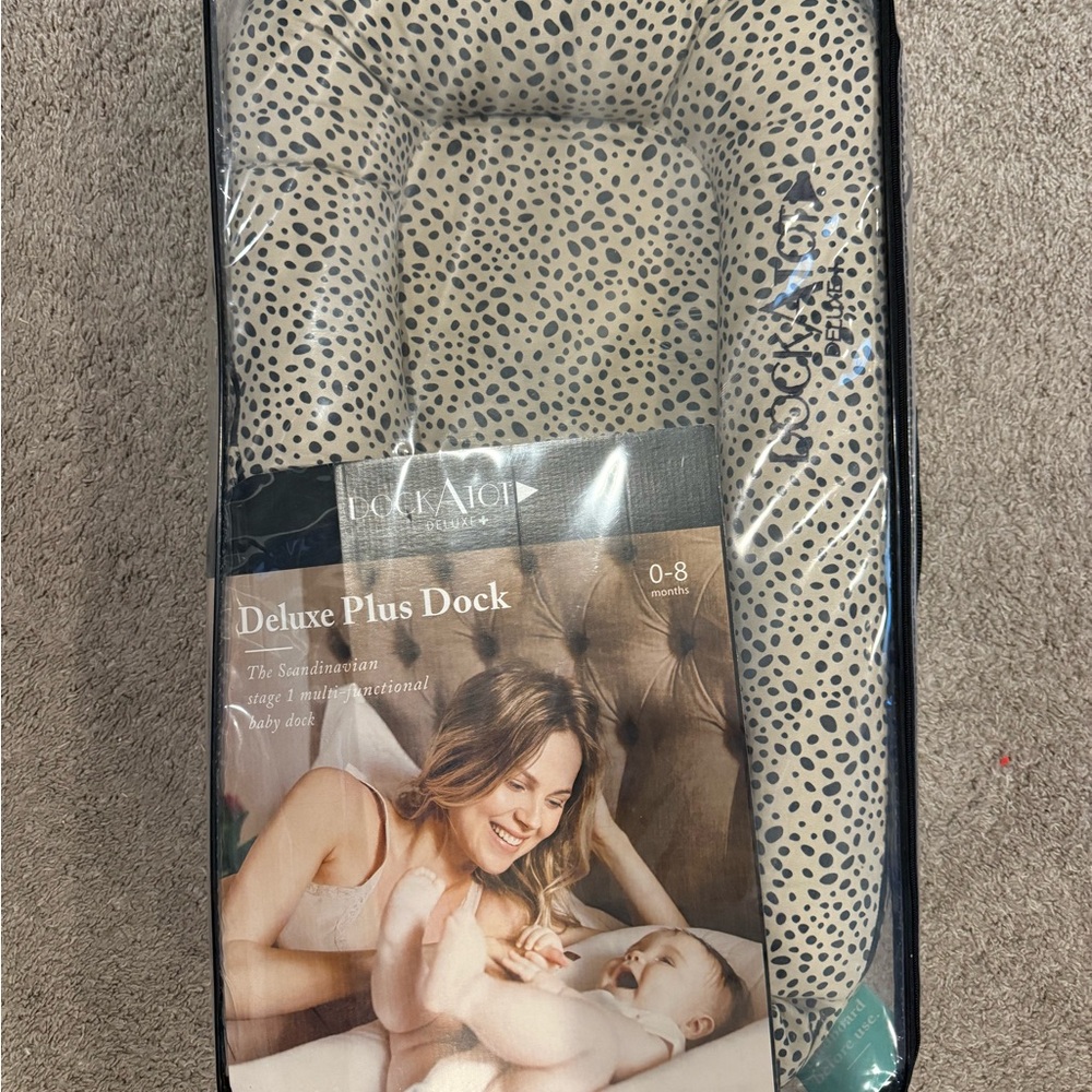 Dock-A-Tot Deluxe Plus Dock with leopard print cover